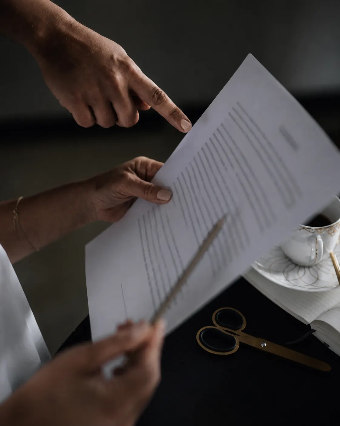 Two people reviewing acceptance evidence together